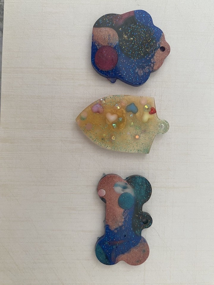 Personalised Pet ID tags by Piggymac Creations, galaxy-style pet ID tags in blue multicolour speckled finish with hole
