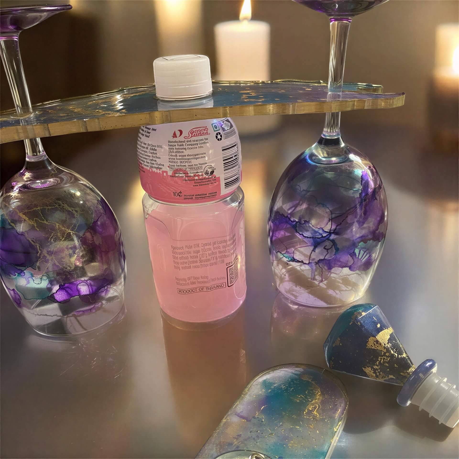 Wine time for my Valentine set featuring purple and blue marbled glasses, a pink drink bottle, and a decorative tray.